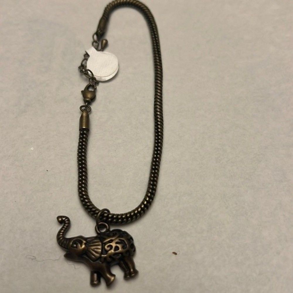 Handcrafted antique gold tone elephant bracelet with built in extender